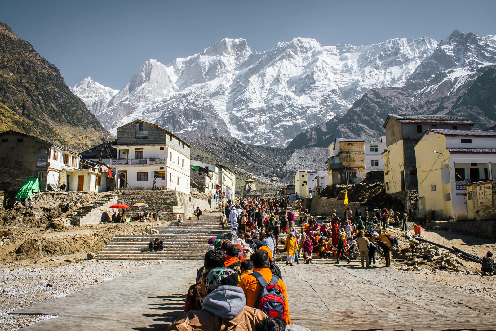Exterior view of Kedarnath Temple showcasing its intricate architectural details and scenic surroundings.