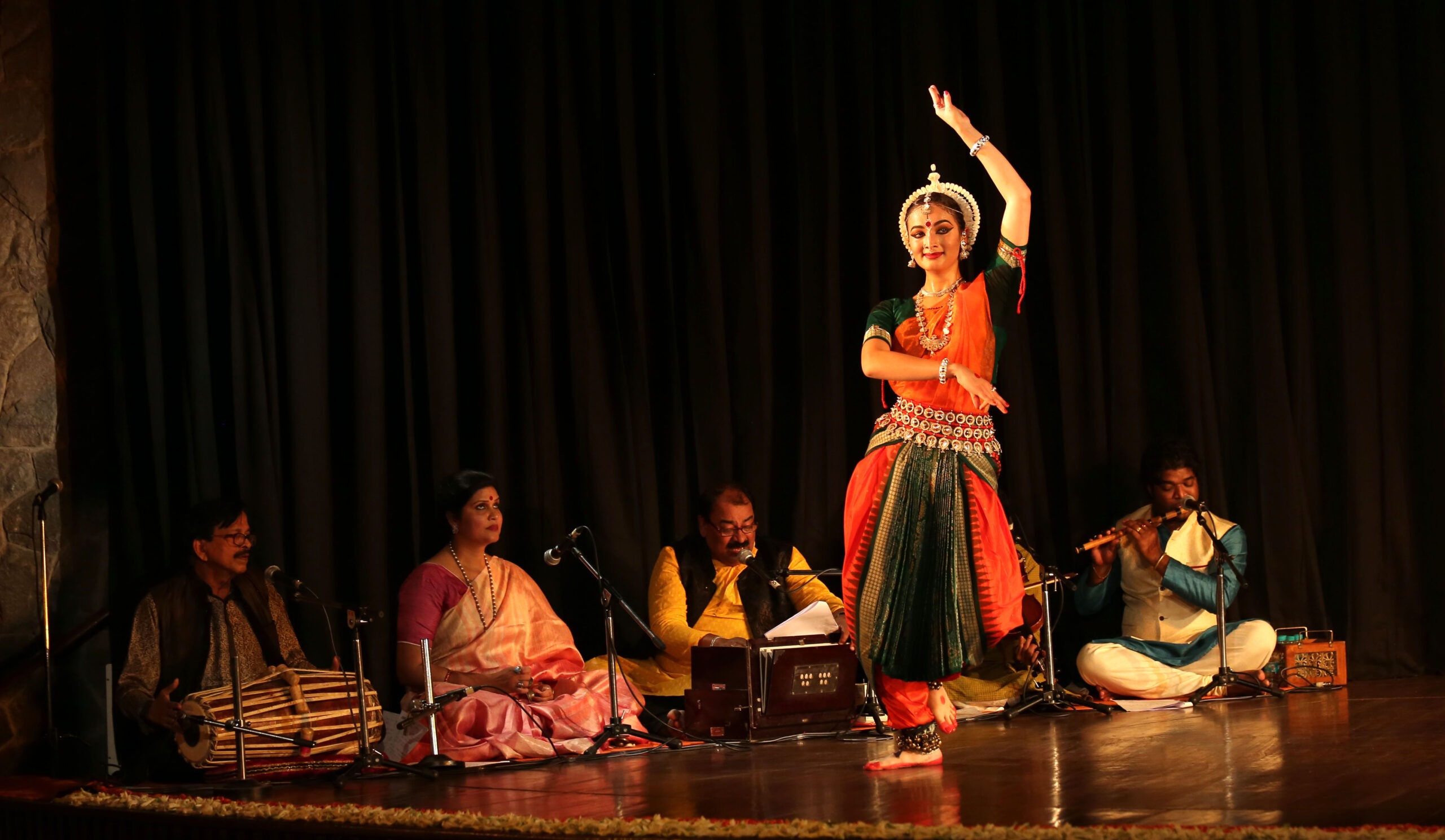Traditional Odissi dance costume with intricate silver jewelry 